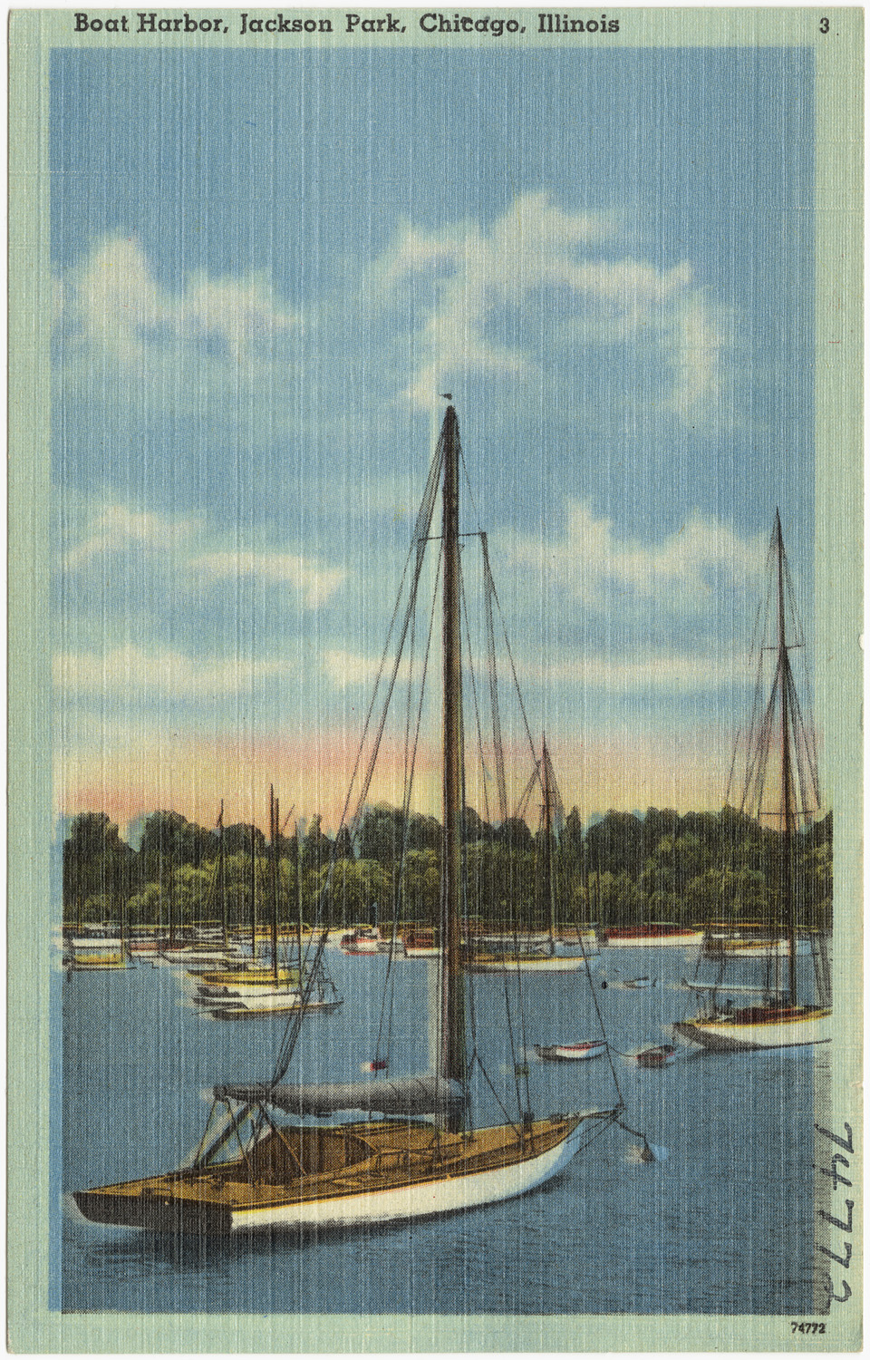 A scenic view of sailboats docked at a harbor in Jackson Park, Chicago.