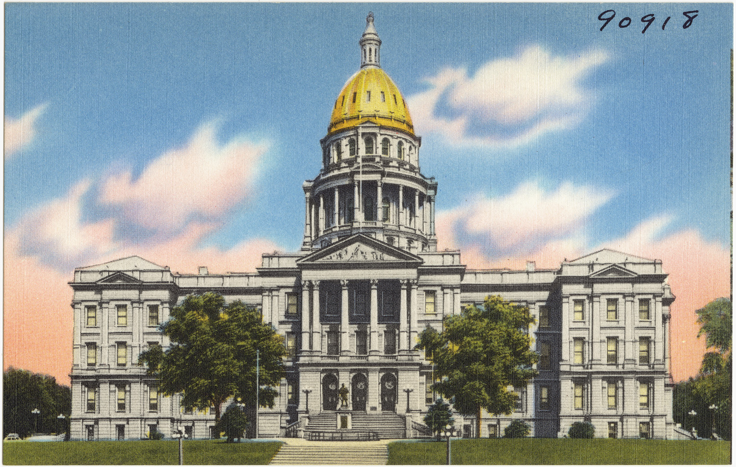 The postcard shows the Colorado State Capitol building with its distinctive golden dome against a vibrant sky.